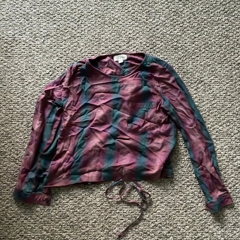 Long sleeve shirt with a braided tie in the back!